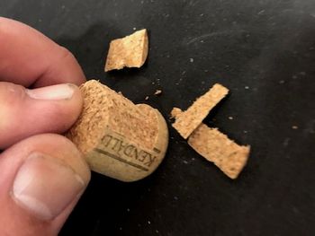 You'll want to cut the groove down to approximately the inside diameter of the bar. If you don't get it quite right, it's OK. Once your groove is cut, carefully slice downward from the cut end of the cork toward your groove, making your way around the cork. Don't overshoot the groove or the visible part of the cork will be damaged. Continue until you've shaved off enough for the cork to fit in the bars. Again, be careful, take your time, and don't cut yourself.