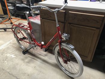 With the wheels cleaned up and rebuilt, and a new pair of white tires, it was time for the second test fit. By this time I had the retro-style LED headlight on and had settled on some Velo Orange North Road bars.