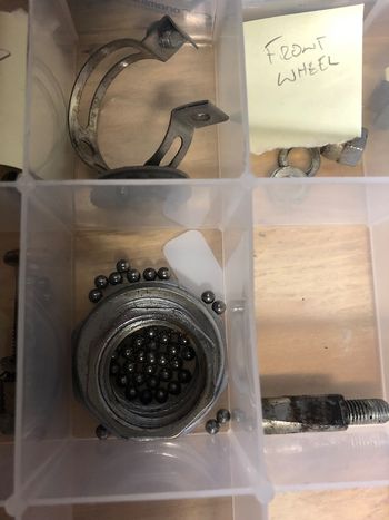All the smart parts are put in bins and tagged as needed to keep track of them. Yes, there are a lot of loose bearings in a Raleigh headset.