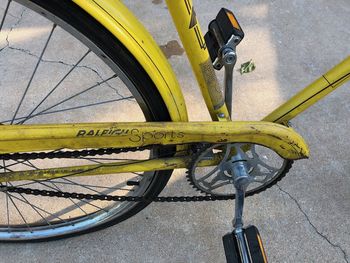 The battered chainguard appeared to be held on mostly with grime, and that three-speed cable may be past its prime. The decal style places it somewhere in the mid-70s, probably.