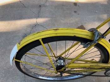The rear fender is similarly battered and rusty.