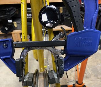 Trueing the wheel, home-style.