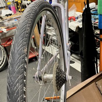 Test-fitting with a spare wheel I had laying around. The string is there for double-checking alignment.