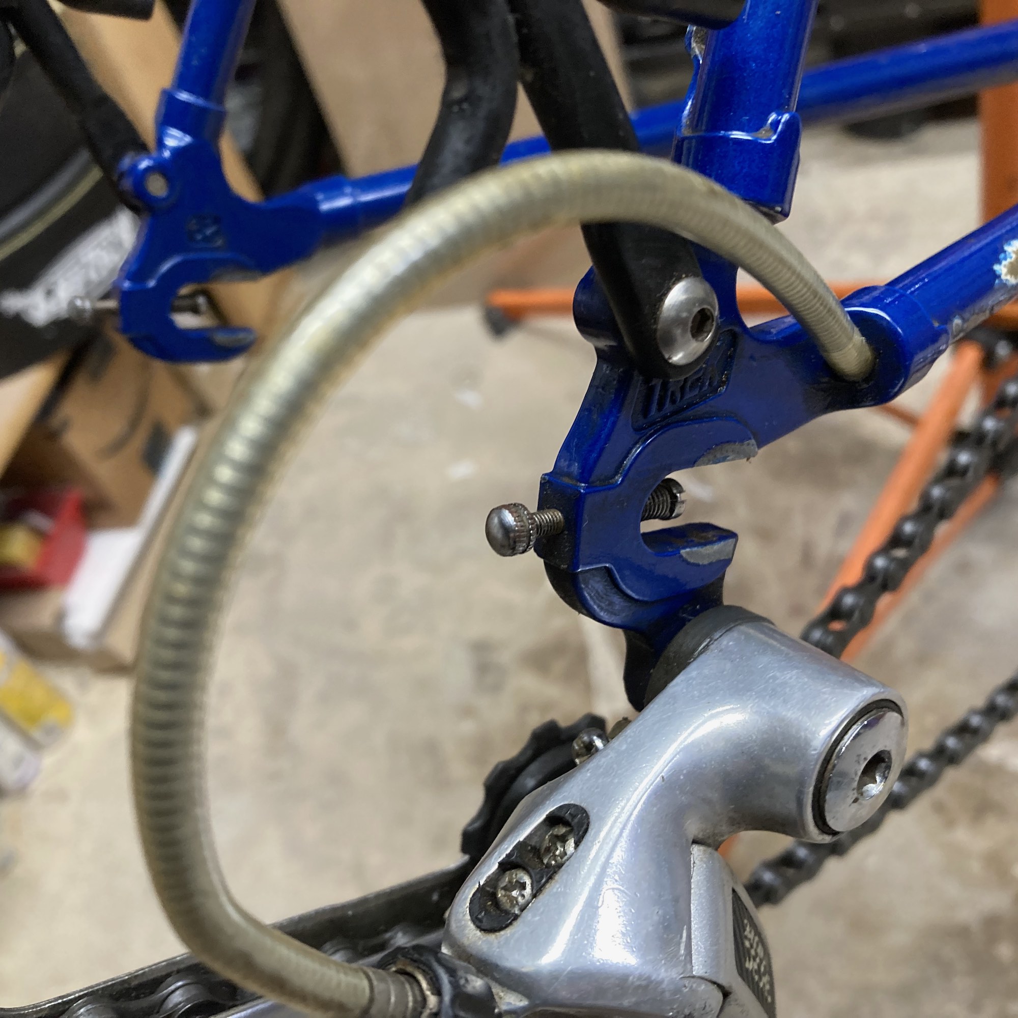 Once it was on the rack and I started taking it apart I couldn't help but notice all the neat details and craftsmanship the Wisconsin Treks were known for, like these lovely proprietary cast dropouts, and the shifter-cable running through the chainstay.