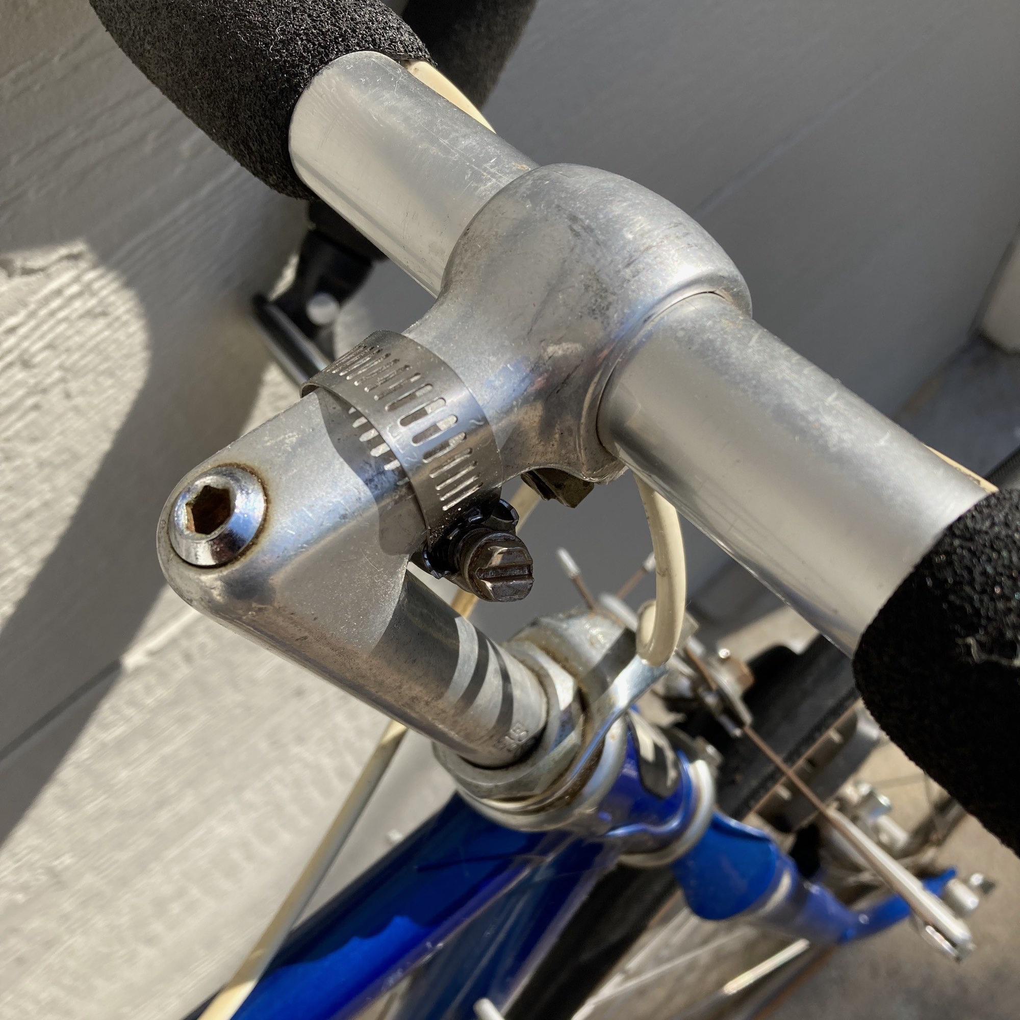 I never did figure out what the hose clamp on the stem was all about.