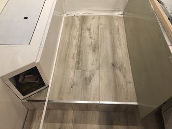 And the new flooring went it. Vinyl planks were easy to work with, worked well with the campers irregular edges and lines, and are waterproof and wear well. Pretty much perfect for this usage.