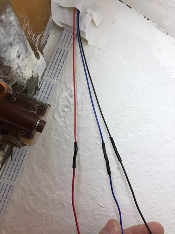 I color-matched the wires and put heat-shrink on the splices. The exrtra-long ribbon cable for the camera is also visible.