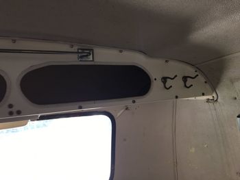 The overhead storage and the front and rear was notable mostly for the sheer number of hooks that you were absolutely certain to hit your head on.