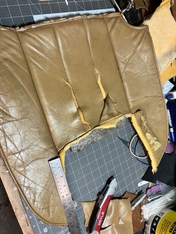 Step one was cutting any usable leather from the old seats. This took awhile.